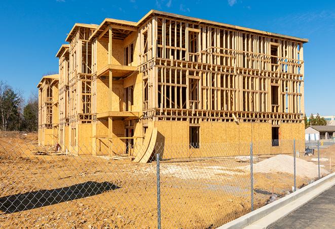 a snapshot of temporary chain link fences protecting a large construction project from unauthorized access in East Hampton